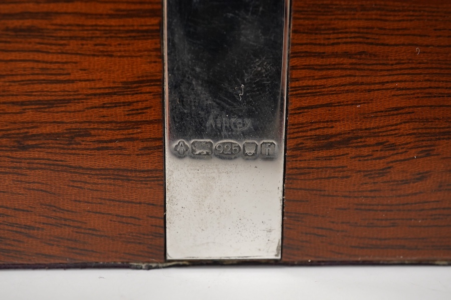 An Asprey & Co. silver mounted humidor, 2005, with key. 26cm wide. Condition - fair to good